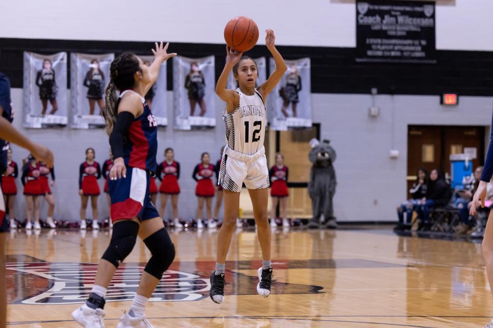 Randall’s Sadie Sanchez (12) with a three-point shot during a district game Tuesday February 8th, Plainview at Randall in Amarillo, TX. Trevor Fleeman/For Amarillo Globe-News.