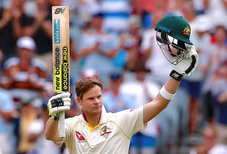 Cricket - Ashes test match - Australia v England - MCG, Melbourne, Australia, December 30, 2017. Australia's captain Steve Smith reacts after reaching his century during the fifth day of the fourth Ashes cricket test match. REUTERS/David Gray