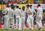 Cricket - India v New Zealand - Third Test cricket match - Holkar Cricket Stadium, Indore, India - 08/10/2016. New Zealand's players celebrate after the wicket of India's Murali Vijay. REUTERS/Danish Siddiqui