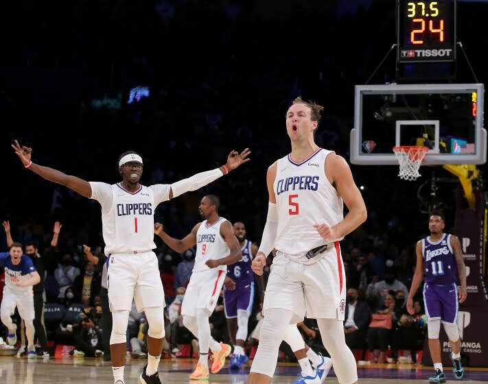 LOS ANGELES, CALIF. - DEC. 3, 2021. Clippers guard Luke Kennard (5) celebrates after hitting a three-pointer.