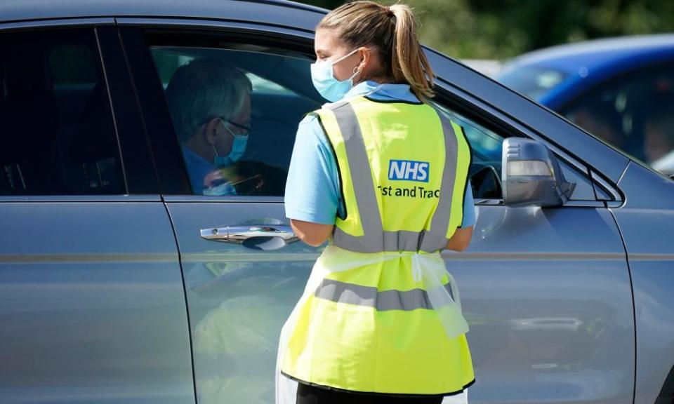 Serco staff working on behalf of NHS Test and Trace operate a coronavirus testing centre in Stone, England.