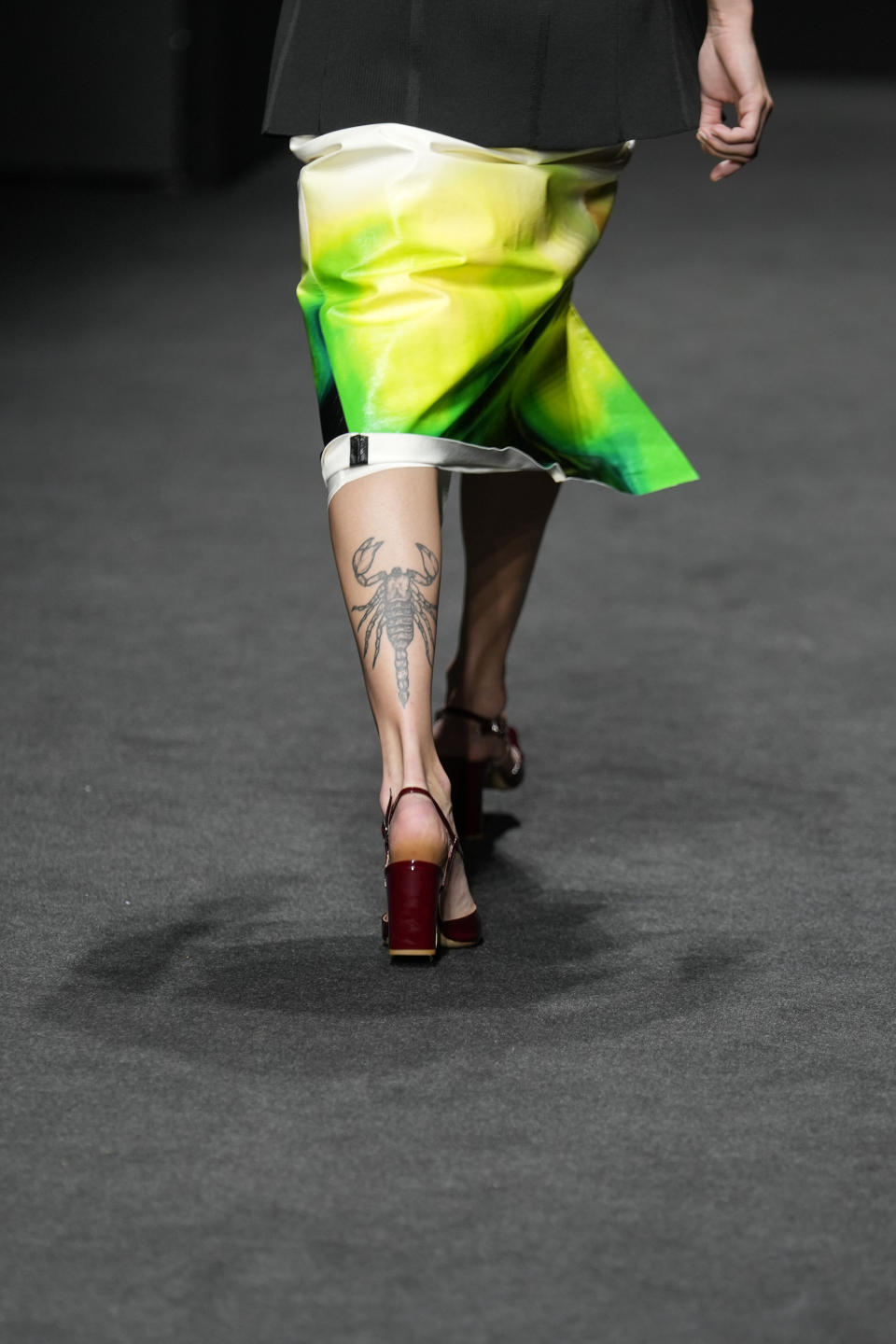 A model wears a creation for the Drome Spring Summer 2022 collection during Milan Fashion Week, in Milan, Italy, Thursday, Sept. 23, 2021. (AP Photo/Antonio Calanni)