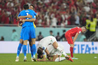 Morocco's players celebrate after winning the World Cup group F soccer match between Canada and Morocco at the Al Thumama Stadium in Doha , Qatar, Thursday, Dec. 1, 2022. (AP Photo/Natacha Pisarenko)