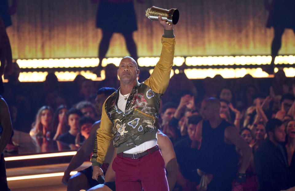 Dwayne Johnson, also known as The Rock, accepts the generation award at the MTV Movie and TV Awards on Saturday, June 15, 2019, at the Barker Hangar in Santa Monica, Calif. (Photo by Chris Pizzello/Invision/AP)