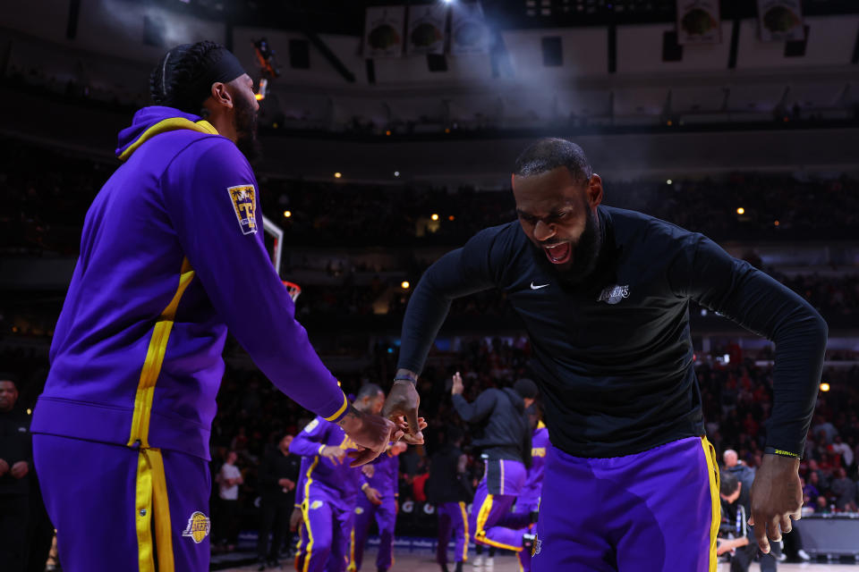 CHICAGO, ILLINOIS - MARCH 29: Anthony Davis #3 and LeBron James #6 of the Los Angeles Lakers celebrate prior to the game against the Chicago Bulls at United Center on March 29, 2023 in Chicago, Illinois. NOTE TO USER: User expressly acknowledges and agrees that, by downloading and or using this photograph, User is consenting to the terms and conditions of the Getty Images License Agreement. (Photo by Michael Reaves/Getty Images)