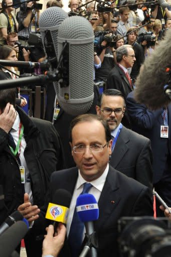 French President Francois Hollande arrives for a meeting of European Union leaders in Brussels