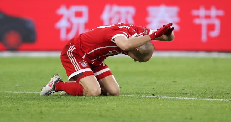 Bayern Munich's midfielder Arjen Robben reacts to a missed penalty