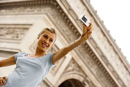 <b>9. The selfie at a famous landmark</b> Great that you made it to the Arc de Triomphe, but was there seriously no one you could ask to take a PROPER photo of you in front of it?