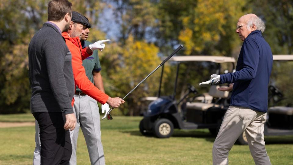 Troy Kotsur with his interpreter Justin Maurer facing off against Larry David in Curb Your Enthusiasm season 12, episode 3