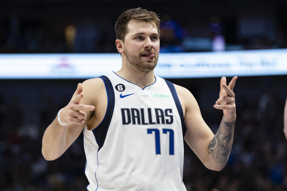 Dallas Mavericks guard Luka Doncic (77) celebrates after a 3-point basket during the first half of an NBA basketball game against the Orlando Magic, Sunday, Oct. 30, 2022, in Dallas. (AP Photo/Brandon Wade)