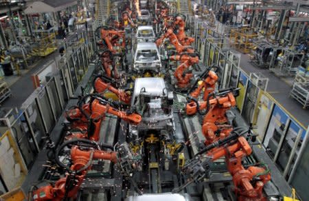 FILE PHOTO: Ford cars are assembled at a plant of Ford India in Chengalpattu, on the outskirts of Chennai, India, March 5, 2012.     REUTERS/Babu/File Photo