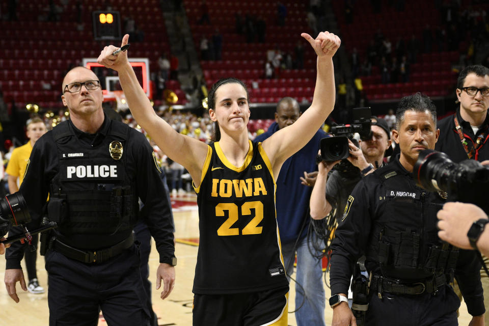 Iowa guard Caitlin Clark (22) walks off the court after an NCAA college basketball game against Maryland, Saturday, Feb. 3, 2024, in College Park, Md. (AP Photo/Nick Wass)