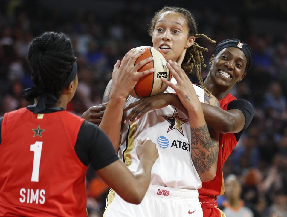 Minnesota Lynx' Sylvia Fowles, of Team Wilson, right, fouls Phoenix Mercury's Brittney Griner, of Team Delle Donne, during the first half of a WNBA All-Star game Saturday, July 27, 2019, in Las Vegas. (AP Photo/John Locher)