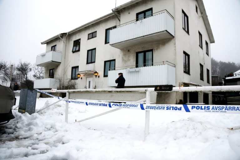 A police officer is seen outside a home for juvenile asylum seekers in Molndal, Sweden on January 25, 2016