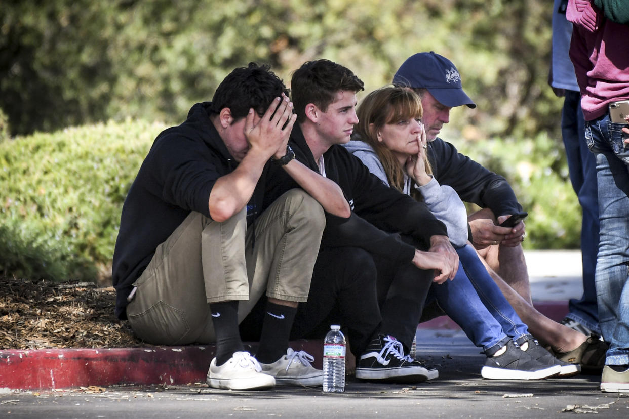 People awaiting word of loved ones after the Borderline Bar &amp; Grill shooting sit outside the Alex Fiore Teen Center in Thousand Oaks, California, on Nov. 8. (Photo: David Crane/Digital First Media/Los Angeles Daily News via Getty Images)