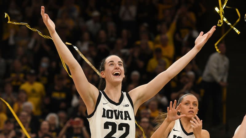 Iowa guard Caitlin Clark (22) celebrates during Senior Day ceremonies following a victory over Ohio State in a game, Sunday, March 3, 2024, in Iowa City, Iowa.