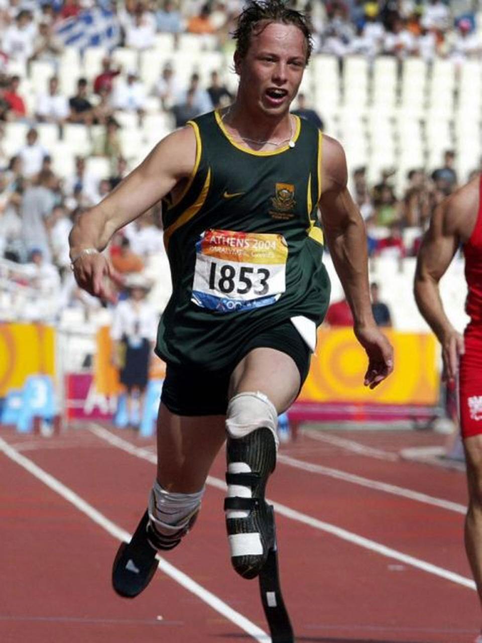 In 2004 at the Athens Paralympic games, a 15-year-old Pistorius won gold in the T44 200m in a Paralympic world record in 21.97s and bronze in the T44 100m final (Getty Images)