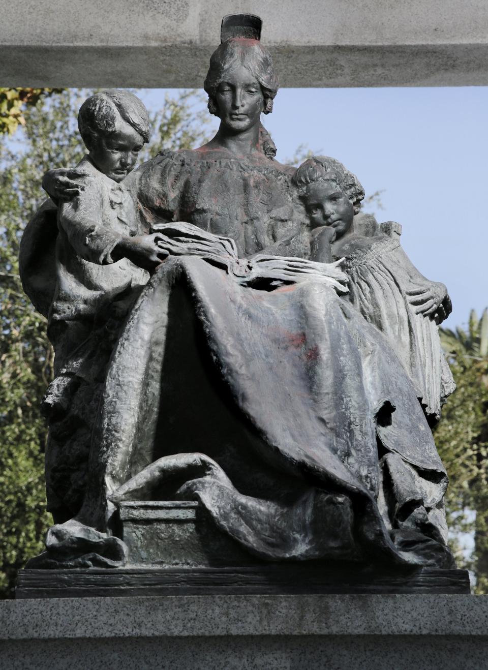 The bronze sculpture of the woman and children in the Women of the Confederacy monument in Springfield Park.