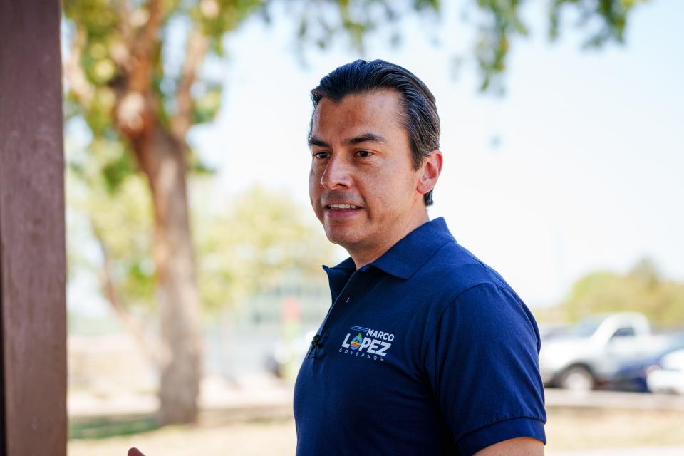 Democratic candidate for governor, Marco Lopez, speaks to voters during a Legislative District 9 Pride event at Fitch Park in Mesa on June 11, 2022.