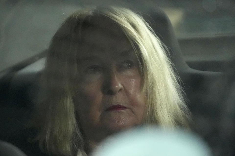 June Steenkamp, the mother of Reeva Steenkamp sits inside the correctional service car at the Atteridgeville Prison for the parole hearing of Oscar Pistorius, in Pretoria, South Africa, Friday, March 31, 2023. The parents of Reeva Steenkamp, the woman Oscar Pistorius shot dead 10 years ago, will oppose the former Olympic runner's application for parole, their lawyer said Friday. (AP Photo/Themba Hadebe)