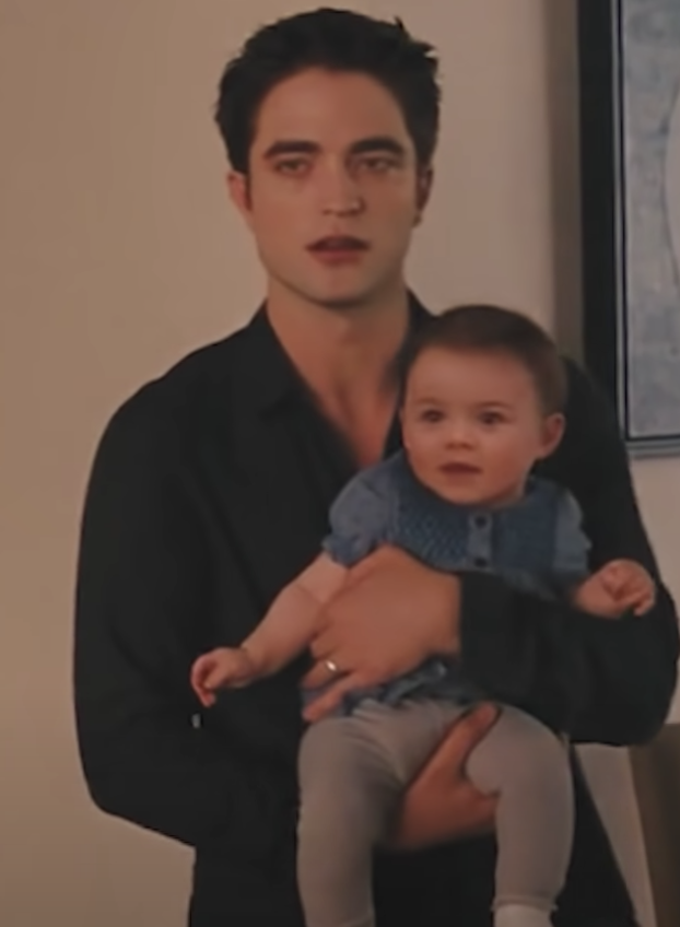 Edward holding Renesmee