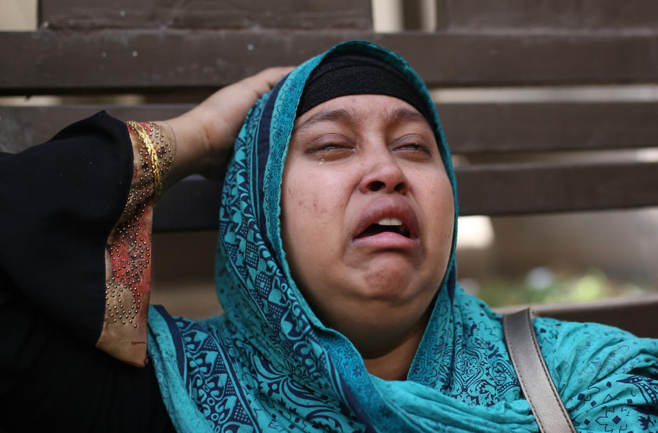 A Bangladeshi woman mourns the death of a relative in a fire, outside a morgue in Dhaka, Bangladesh, Feb. 21, 2019. (Photo: Mahmud Rehman Asad/AP)