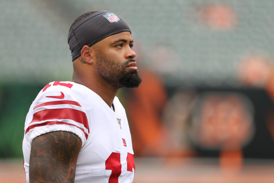 Cody Latimer stands on the field.