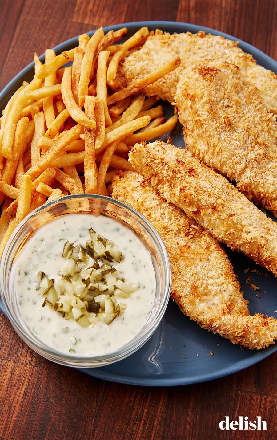 <p>We love classic fish and chips and normally turn to our favorite <a href="https://www.delish.com/cooking/recipe-ideas/a26258755/beer-battered-fish-recipe/" rel="nofollow noopener" target="_blank" data-ylk="slk:beer-battered fish;elm:context_link;itc:0;sec:content-canvas" class="link ">beer-battered fish</a> when the craving hits, but when we don't feel like deep frying? This air fryer fish is the perfect substitute. It is every bit as crunchy and the <a href="https://www.delish.com/cooking/recipe-ideas/g40288597/cod-recipe-ideas/" rel="nofollow noopener" target="_blank" data-ylk="slk:cod;elm:context_link;itc:0;sec:content-canvas" class="link ">cod</a> stays <em>perfectly</em> flaky.</p><p>Get the <strong><a href="https://www.delish.com/cooking/recipe-ideas/a28414646/air-fryer-fish-recipe/" rel="nofollow noopener" target="_blank" data-ylk="slk:Air Fryer Fish recipe;elm:context_link;itc:0;sec:content-canvas" class="link ">Air Fryer Fish recipe</a></strong>.</p>