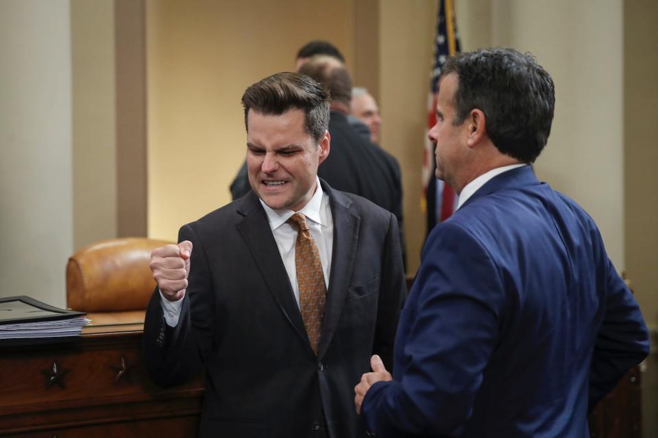 Rep. Matt Gaetz (R-FL) speaks top Rep. John Ratcliffe (R-TX) at the conclusion of testimony from top U.S. diplomat in Ukraine William B. Taylor and Deputy Assistant Secretary for European and Eurasian Affairs George P. Kent before the House Intelligence Committee in the Longworth House Office Building on Capitol Hill November 13, 2019 in Washington, DC.