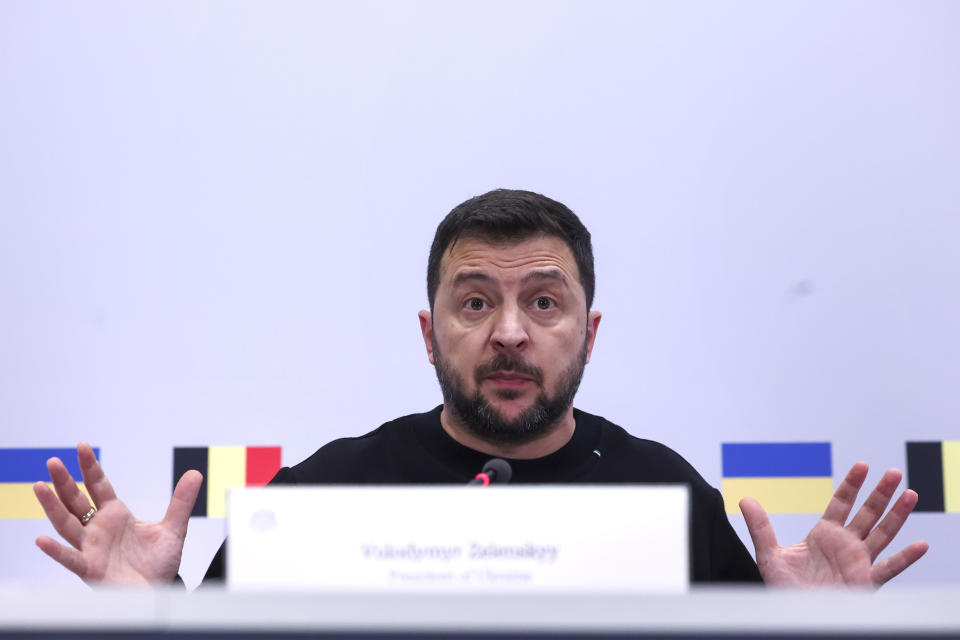 Ukraine's President Volodymyr Zelenskyy addresses a media conference at the office of Belgian prime minister Alexander De Croo in Brussels, Wednesday, Oct. 11, 2023. (Yves Herman, Pool Photo via AP)