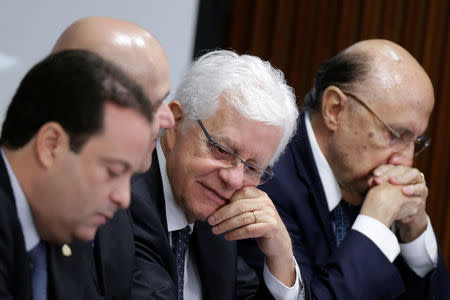 Minister of the General Secretary of the Presidency of Brazil, Wellington Moreira Franco (C) attends a meeting of the Pension Reform Commission with Brazil's president Michel Temer at the Planalto Palace in Brasilia, Brazil, April 11, 2017. REUTERS/Ueslei Marcelino