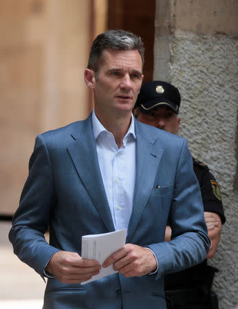 Inaki Urdangarin, Spain's King Felipe's brother-in-law, leaves court after picking up his prison sentence notification in Palma de Mallorca, Spain, June 13, 2018. REUTERS/Enrique Calvo
