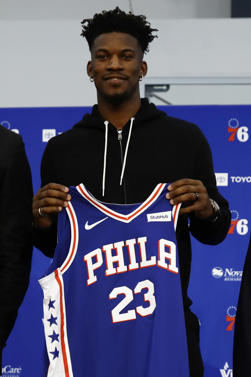 Philadelphia 76ers' Jimmy Butler poses during an introductory news conference at the NBA basketball team's practice facility in Camden, N.J., Tuesday, Nov. 13, 2018. (AP Photo/Matt Rourke)