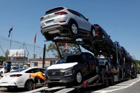 Automobiles are on a truck for delivery to a car lot in Queens, New York, U.S., May 24, 2018. REUTERS/Shannon Stapleton