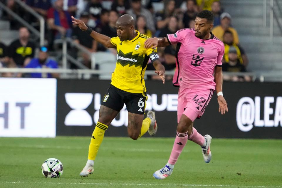 Aug 13, 2024; Columbus, Ohio, USA; Columbus Crew midfielder Darlington Nagbe (6) tries to get past Inter Miami CF defender Yannick Bright (42) during the first half of the Leagues Cup round of 16 game at Lower.com Field.