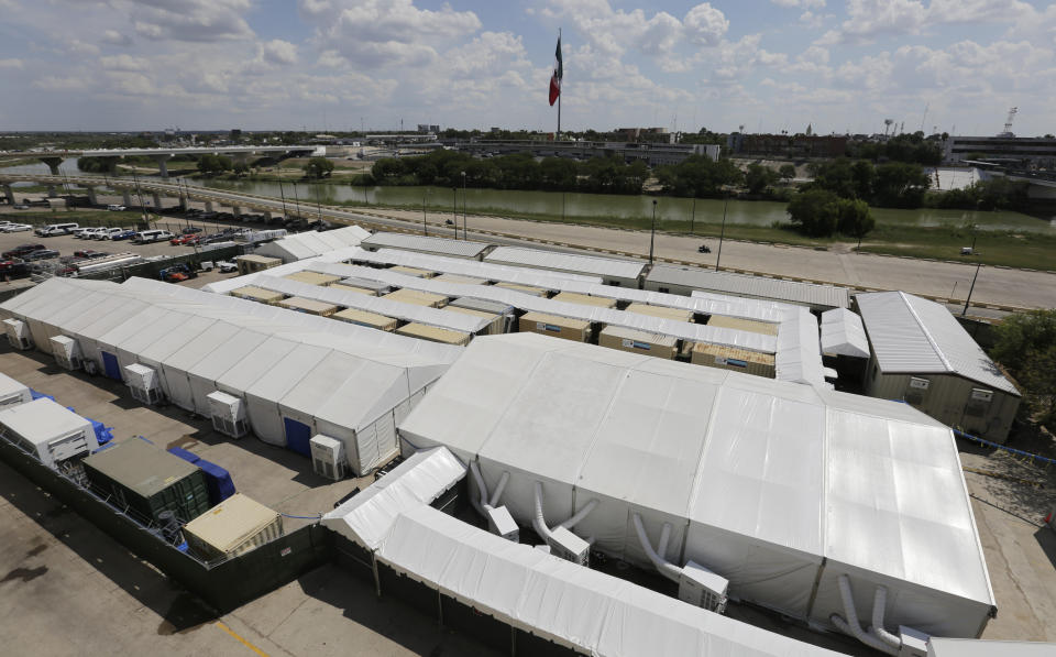 The Migration Protection Protocols Immigration Hearing Facility, a new tent court facility made up of tents and portable pods, Tuesday, Sept. 17, 2019, along the Rio Grande in Laredo, Texas. (AP Photo/Eric Gay)