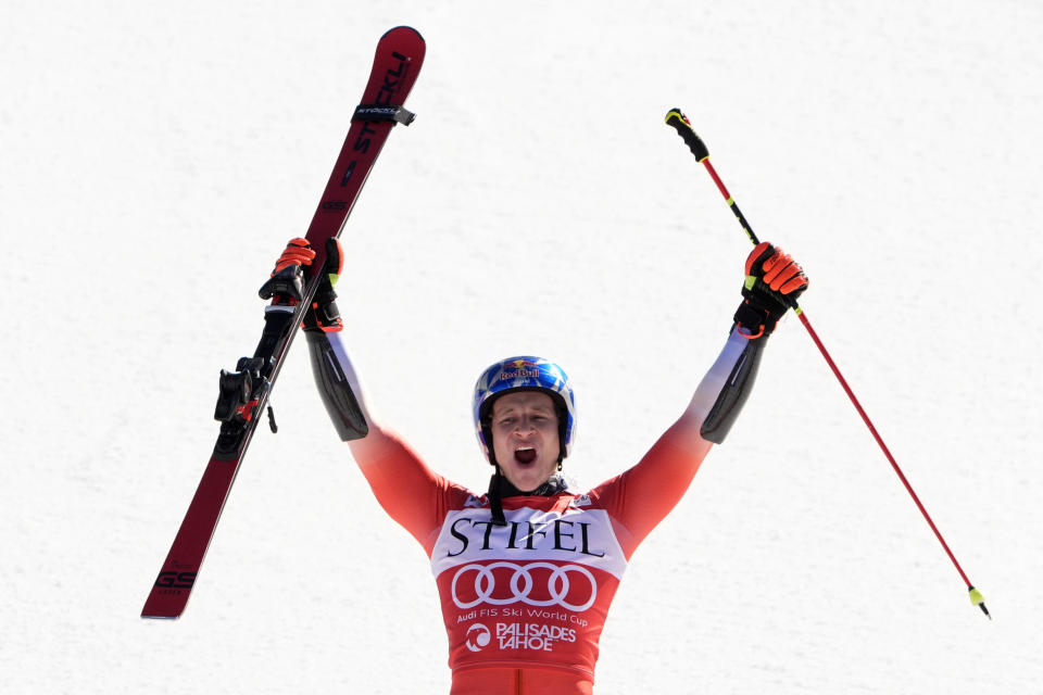 Marco Odermatt, of Switzerland, celebrates his victory in men's World Cup giant slalom skiing race Saturday, Feb. 24, 2024, at Palisades Tahoe ski resort in Lake Tahoe, Calif. (AP Photo/Robert F. Bukaty)