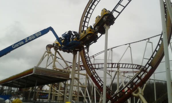 Firefighters rescue eight people stuck on broken rollercoaster