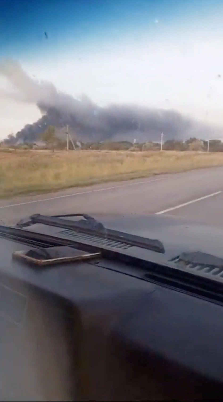 A screengrab showing thick black smoke billowing above the airfield on Thursday (via REUTERS)