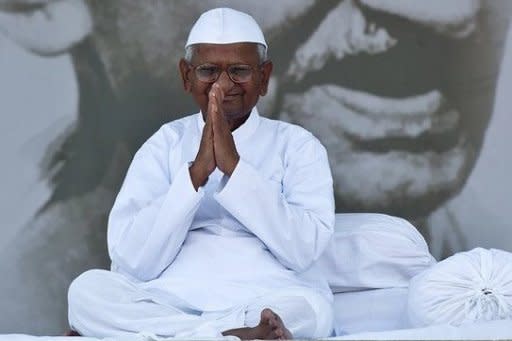 Indian anti-corruption activist Anna Hazare ended his 13-day hunger strike on Sunday triggering wild celebrations among supporters after parliament agreed to consider his demands