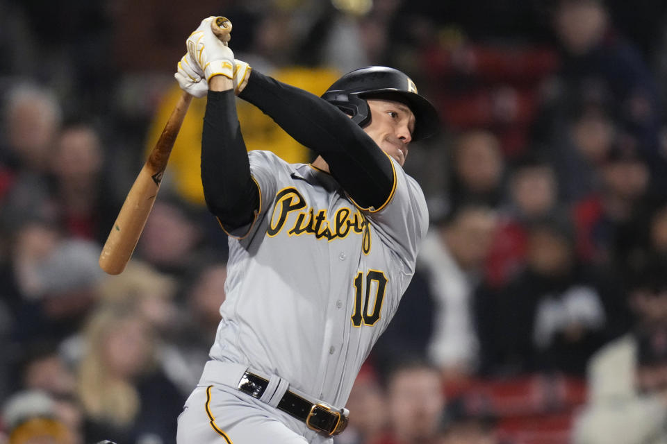 Pittsburgh Pirates' Bryan Reynolds watches the flight of his solo home run off Boston Red Sox starting pitcher Nick Pivetta during the third inning of a baseball game at Fenway Park, Tuesday, April 4, 2023, in Boston. (AP Photo/Charles Krupa)