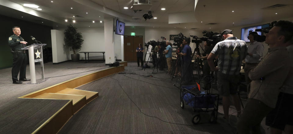 Orange County Sheriff John Mina addresses the media during a press conference about multiple shootings, Wednesday, Feb. 22, 2023, in Orlando, Fla. A central Florida television journalist and a little girl were fatally shot Wednesday afternoon near the scene of a fatal shooting from earlier in the day, authorities said. Mina said that they’ve detained Keith Melvin Moses, 19, who they believe is responsible for both shootings in the Orlando-area neighborhood. (Ricardo Ramirez Buxeda/Orlando Sentinel via AP)