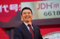 Xin Lijun, CEO of JD Health, attends a ceremony to mark the listing of the company stock on the Hong Kong Stock Exchange at the JD Headquarters in Beijing Tuesday, Dec. 8, 2020. Shares in China's biggest online health care platform rose 40% in their Hong Kong stock market debut Tuesday, reflecting investor enthusiasm for the fledgling industry as the country emerges from the coronavirus pandemic. (AP Photo/Ng Han Guan)