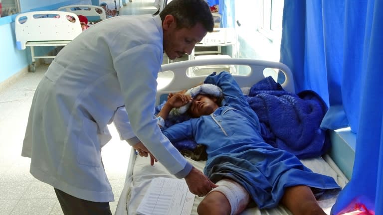 A Yemeni man, wounded in an air raid on a wedding party, receives treatment at a hospital in Hajjah province on April 23, 2018