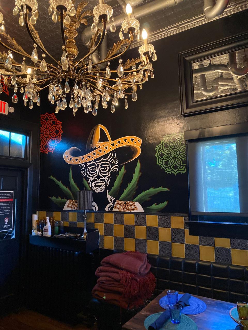 Murals highlight every wall at La Dama Mexican Kitchen and Bar.