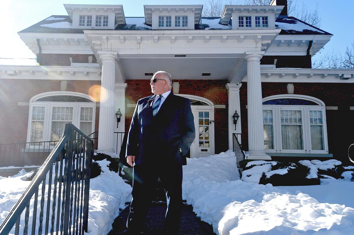 Owner James Scott stands outside the W. James Scott Jr Funeral Home in Erie on Jan. 21. Efforts are underway to lease or reuse the now-vacant funeral home.