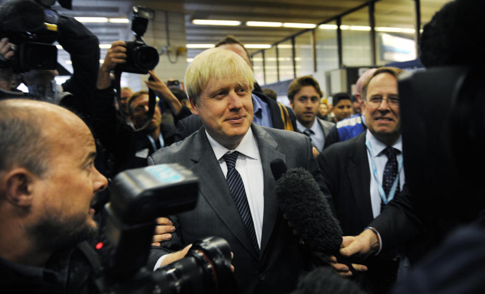 London Mayor Boris Johnson arrives at Birmingham New Street Station before attending the Conservative Party conference today.