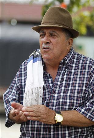 Rogelio Orozco, 75, speaks during an interview in Gaitania in the department of Tolima May 3, 2014. REUTERS/Jaime Saldarriaga