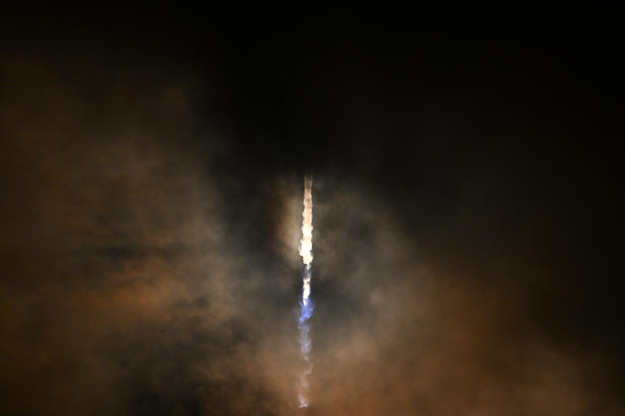 A SpaceX Falcon 9 rocket with the Dragon capsule, carrying the crew of the Polaris Dawn mission, heads to orbit.