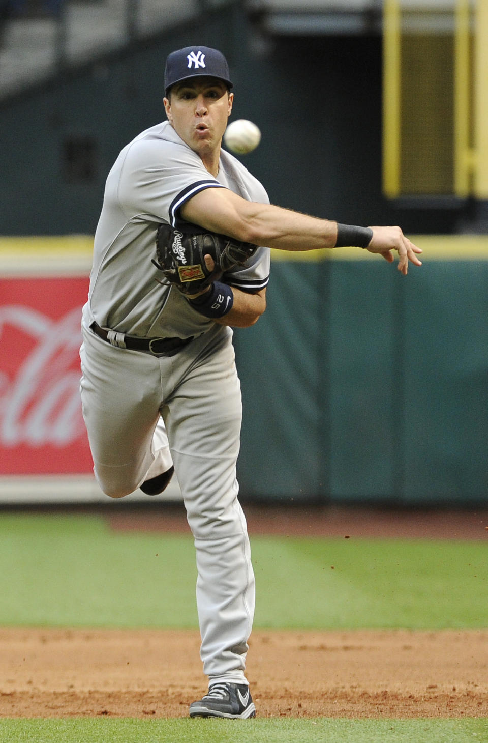 New York Yankees first baseman Mark Teixeira throws home against the Houston Astros in a baseball game on opening day Tuesday, April 1, 2014, in Houston. (AP Photo/Pat Sullivan)